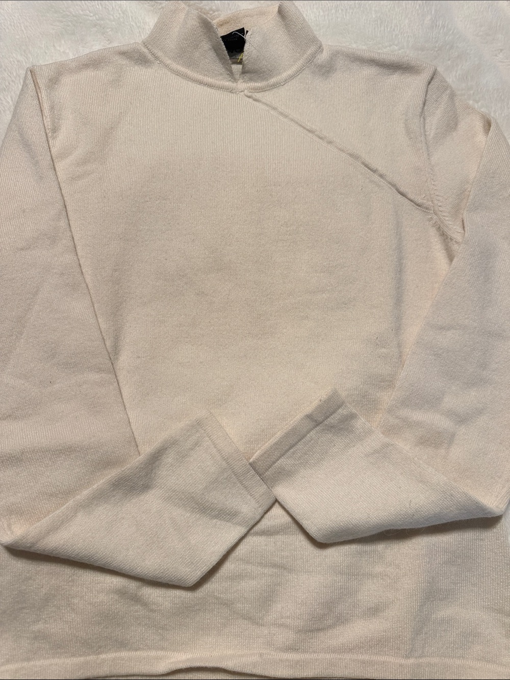 Tracy M Cream Mock Neck Sweater72% silk combined with angora and nylon.